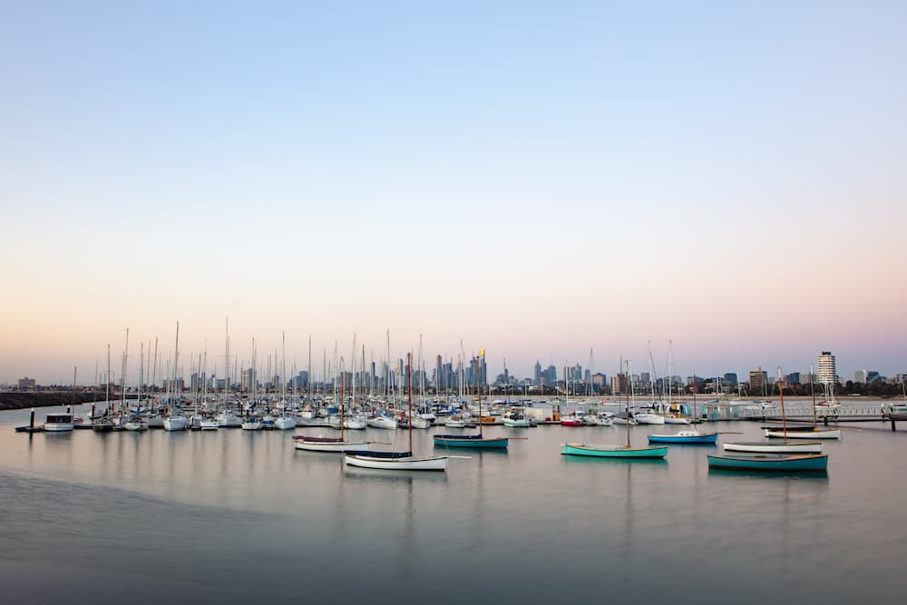 melbourne australia skyline with boats on water