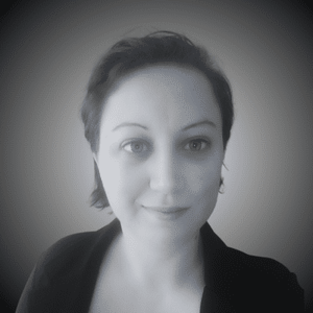 Professional headshot of Suzanna Greendale, development specialist at Clickify